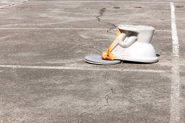 istock flush toilet upside down on outdoor cement 521233116