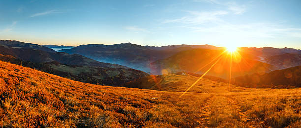istock Sunrise in autumn Carpathian. 521236094