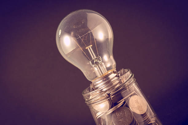 istock lamp and money with filter effect retro vintage style 521237280