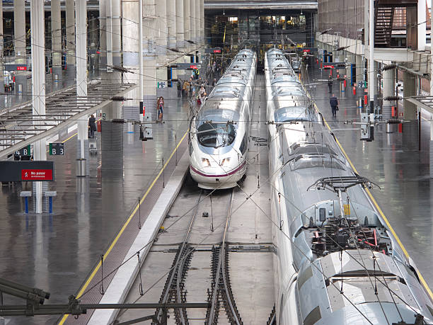 Madrid, Spain - February 21, 2013: A speed train in Atocha Station, Madrid. Spain's main cities are connected by high-speed trains.