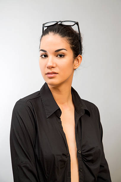 istock Pretty young woman with glasses 521245863