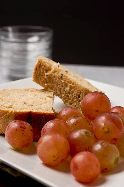 istock Healthy Whole Grain Bread and Red Grapes 521246981
