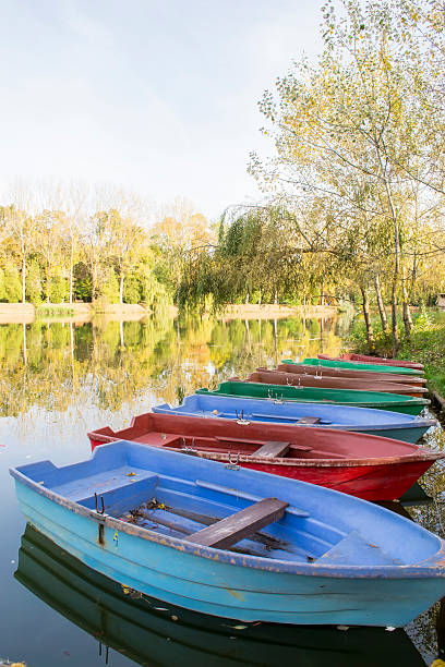 istock Boats on lake shore in autumn 521247235