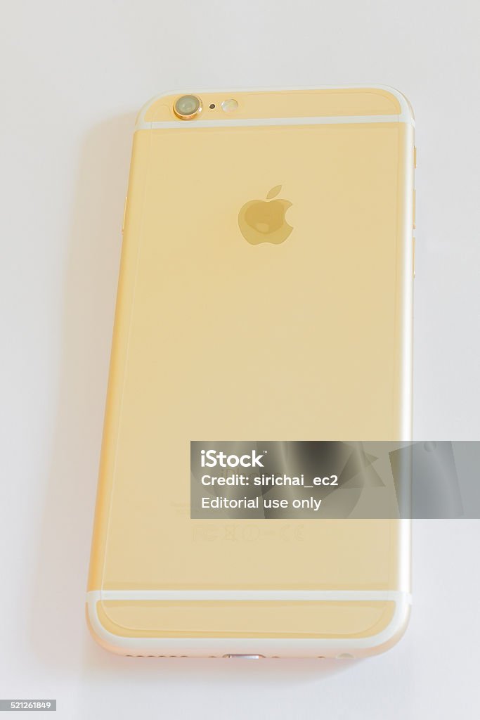 New iPhone 6 gold Chiang Mai, Thailand - November 1, 2014: New iPhone 6  on white background. New Apple iPhone tends to become one of the most popular smart phones in the world. Apple Computers Stock Photo