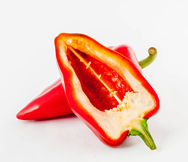 istock Red sweet pepper isolated on white background 521261919