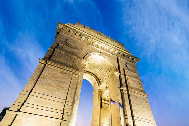 India Gate at New Delhi and blue cloudy sky background