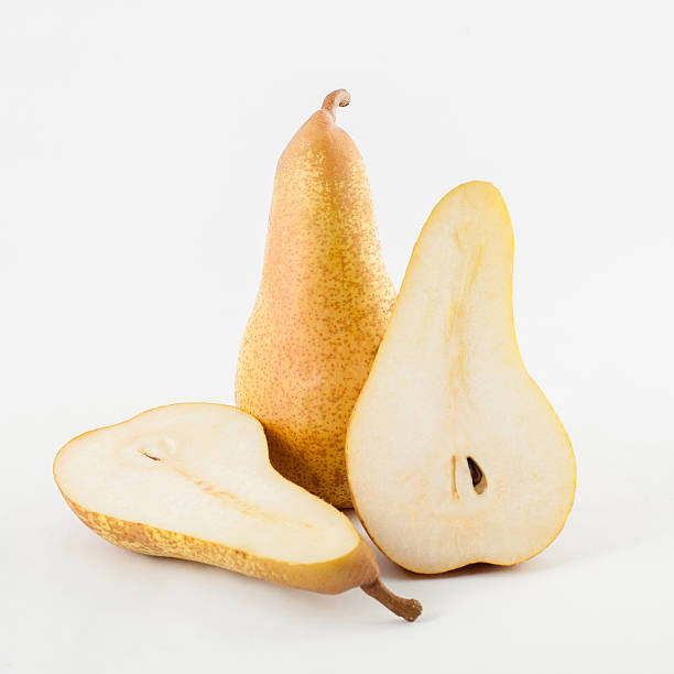 istock ripe yellow pears isolated on white background. 521262847