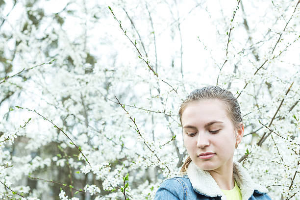 istock Beautiful women in the fruit garden at spring. 521263106