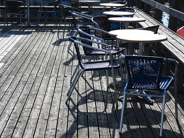 istock Outdoor restaurant  cafe chairs with table 521263605