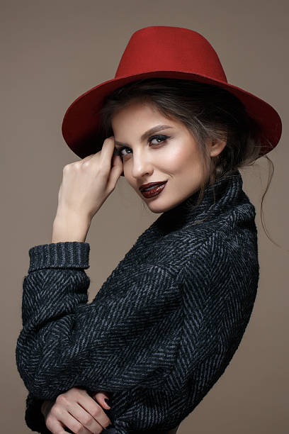 istock Glamour portrait model in hat and coat, professional make up 521264068