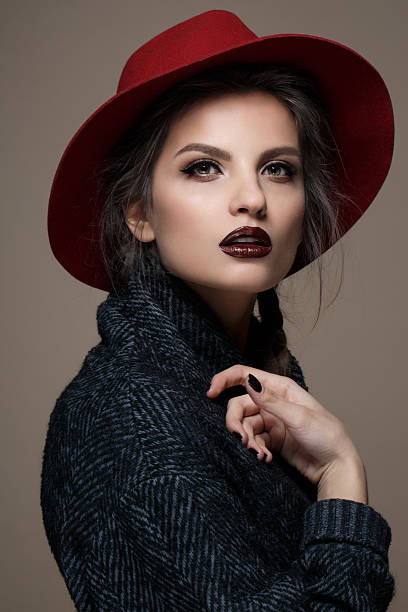 istock Glamour portrait model in hat and coat, professional make up 521264110