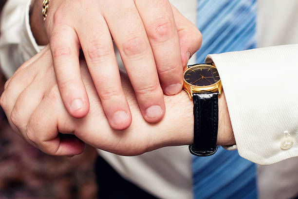 istock watch on the man's hand 521266298