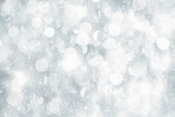 istock Abstract silver Christmas background with white snowflakes 521266423