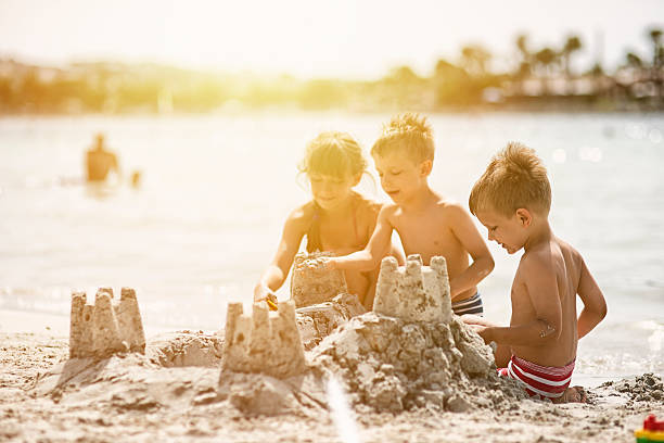 Kids building a sandcastle