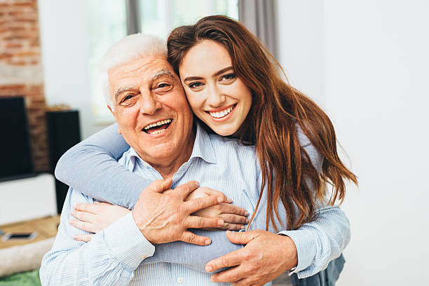 Family Beautiful woman with her father as they both smile father and daughter stock pictures, royalty-free photos & images