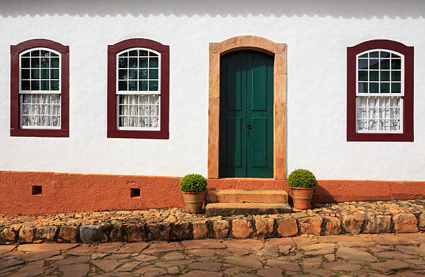 bright colored facade bright colored facade of traditional brazilian rural house at Brazil paraty brazil stock pictures, royalty-free photos & images