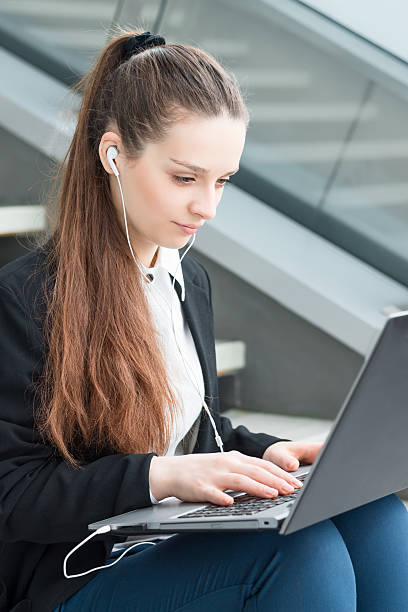 istock Business woman with laptop 521268946