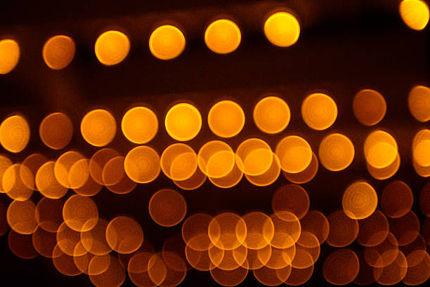 istock Lights blurred bokeh background in night city street 521270416