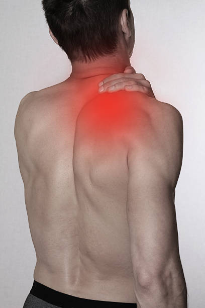 istock Man with pain in shoulder / back. 521270928