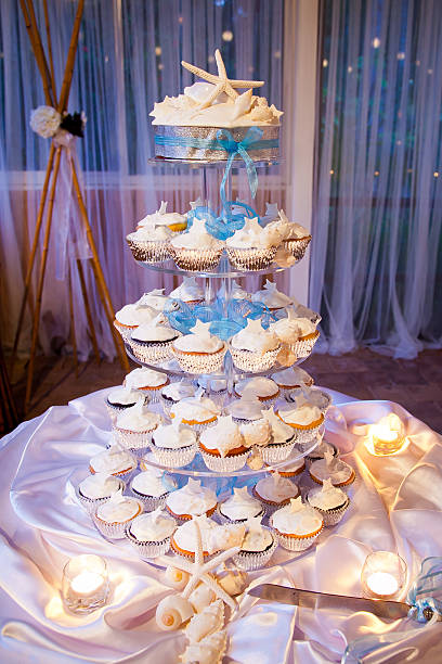 Beach Theme Wedding Cup Cakes with Starfish and Shells stock photo
