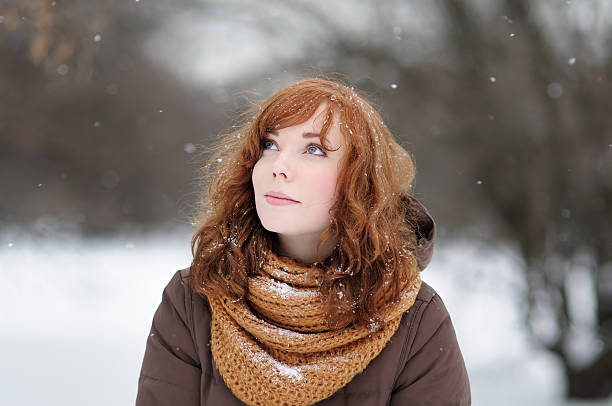istock Young beautiful woman in winter 521289663