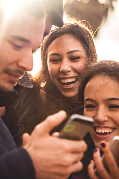 istock Group of happy friends taking a selfie 521289793