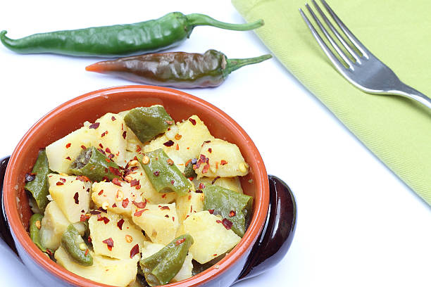 istock Bowl with potatoes and chili pepper 521290541