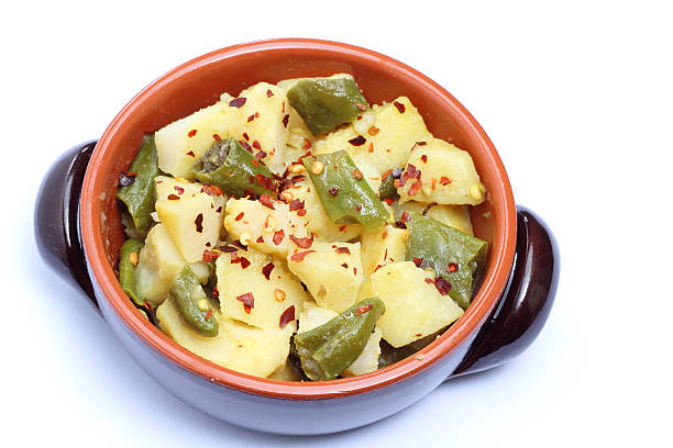istock Bowl with potatoes and chili pepper 521290543