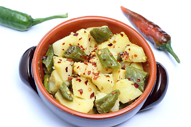 istock Bowl with potatoes and chili pepper 521290545