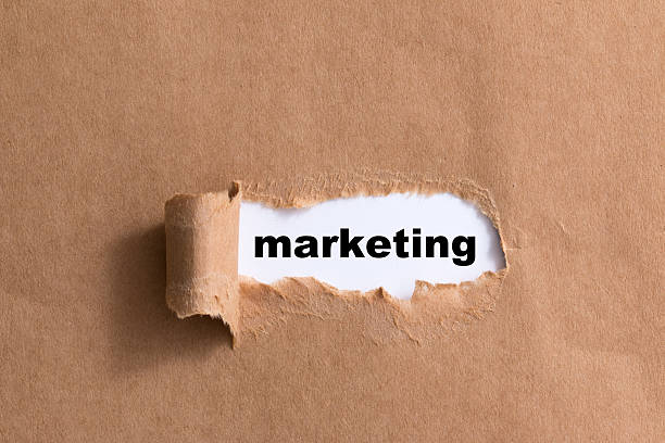 istock word marketing ripped paper isolated background 521291113