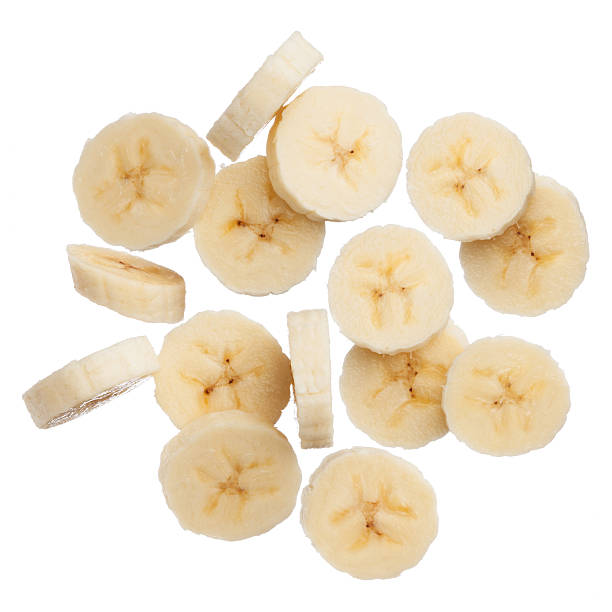 banana slices isolated on white background - muz stok fotoğraflar ve resimler