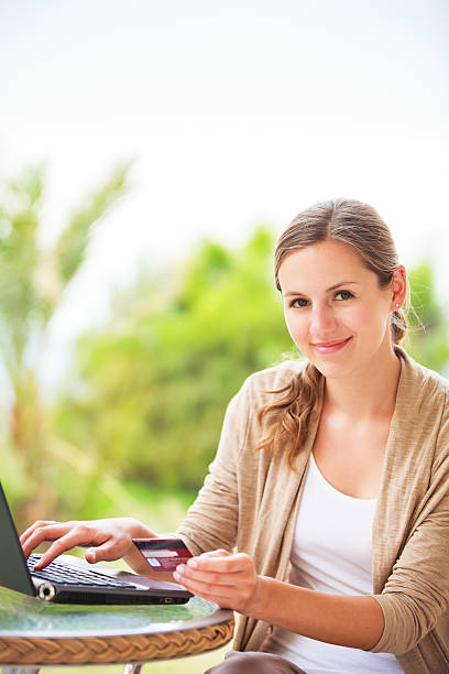 istock Portrait of a pretty young woman working on her computer 521293549
