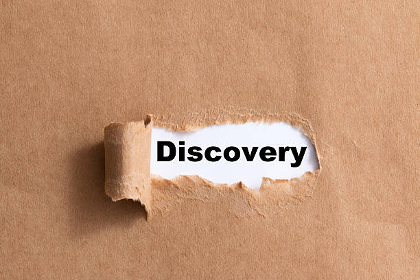 istock word discovery ,ripped paper isolated background 521295083