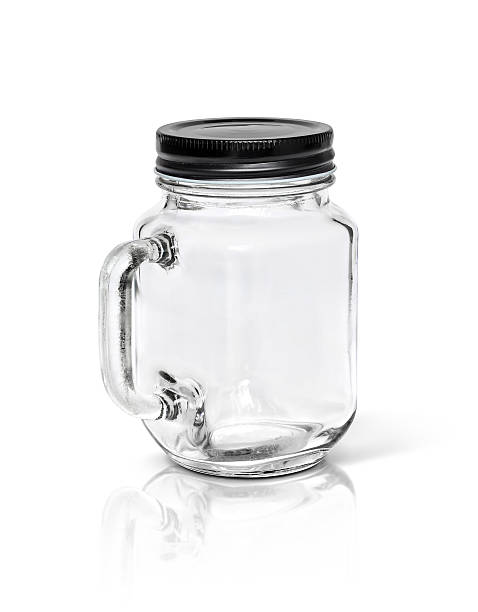 istock Clear glass bottle with black aluminium cap 521300368