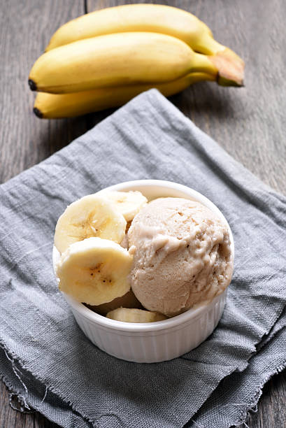 Banana ice cream Banana ice cream in bowl, country style homemade icecream stock pictures, royalty-free photos & images