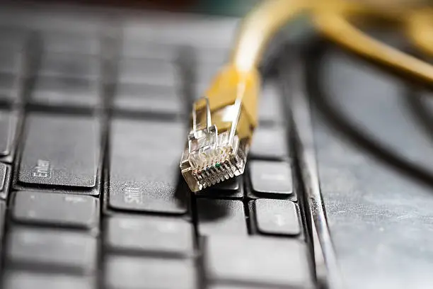 Network cable on computer keyboard