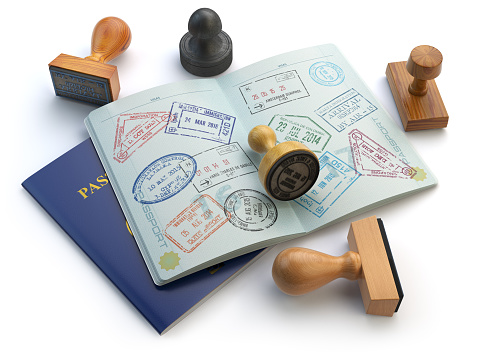 Viaje o turismo concepto. Abierto pasaporte con visa estampillas photo