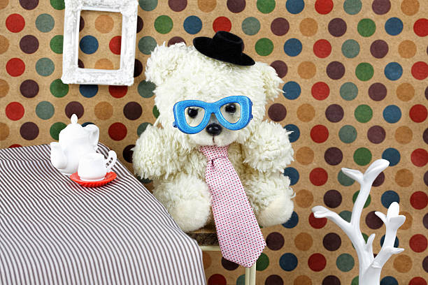 istock Generic teddy wearing a tie with cup of coffee. Father 521307908