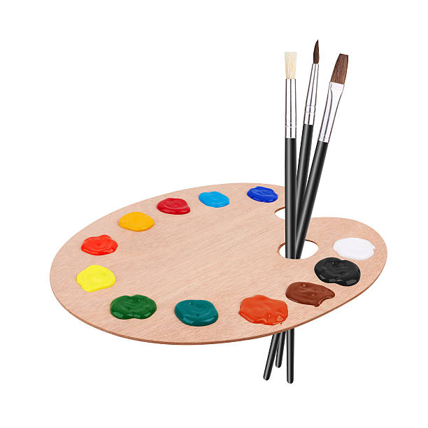 istock Wooden art palette with paints and brushes 521308596