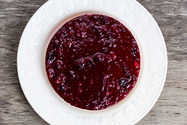 istock Black berry fruit cheesecake on plate. view from top 521308704