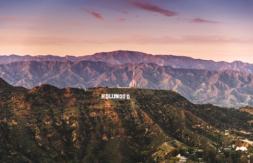 Los Angeles, California, USA - March 23, 2016: Aerial view of the Hollywood sign at dusk in Los Angeles. The image has been taken from an helicopter flying over LA.