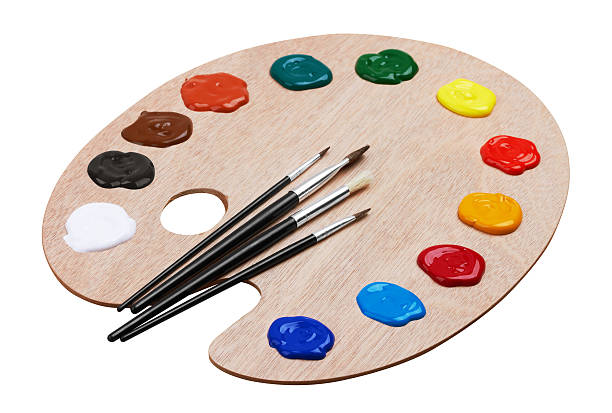 istock Wooden art palette with paints and brushes 521309160