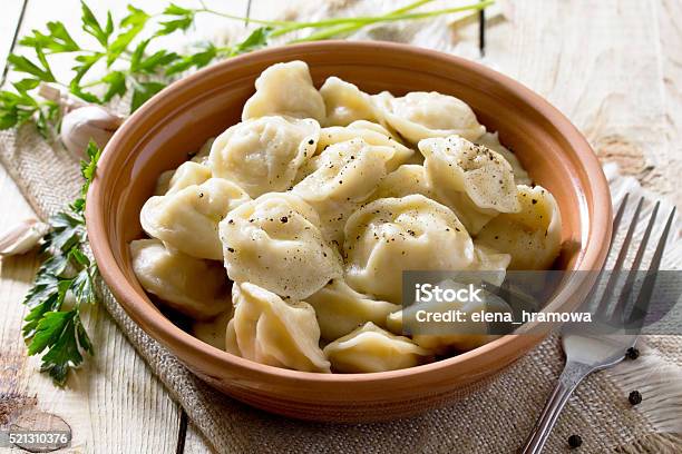 Dumplings With Meat In The Bowl On The Table Stock Photo - Download Image Now - Bay Leaf, Brown, Close-up