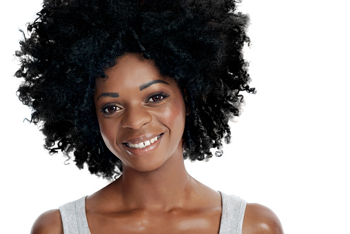 Portrait of african woman with afro smiling casual
