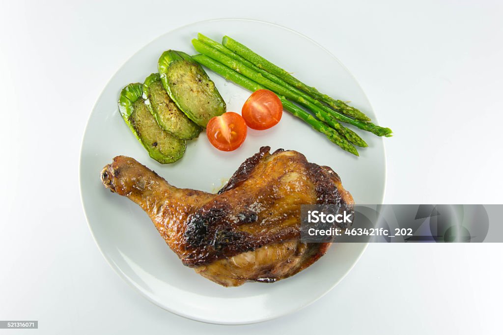 Closeup of roast chicken and vegetables Closeup of roast chicken and vegetables. Barbecue - Meal Stock Photo