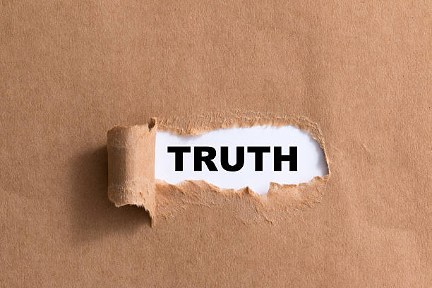 istock word truth on ripped paper isolated background 521316107