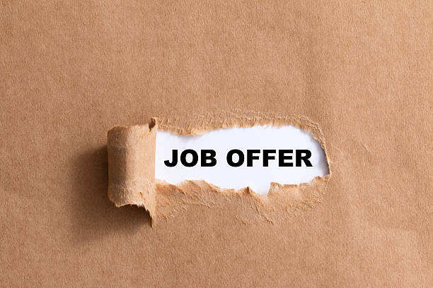 istock job offer on  ripped paper isolated background 521316655