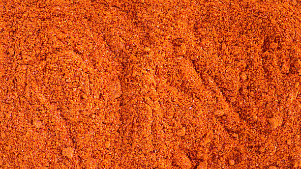 istock Dry herb powder— Red chillies, for background. 521319569