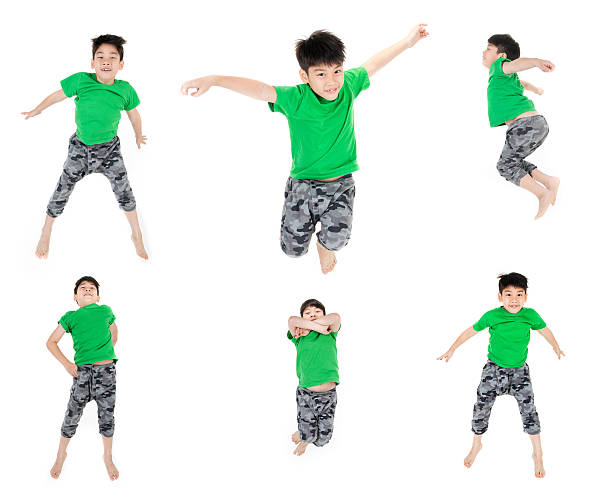Group of Asian cute child is jumping stock photo
