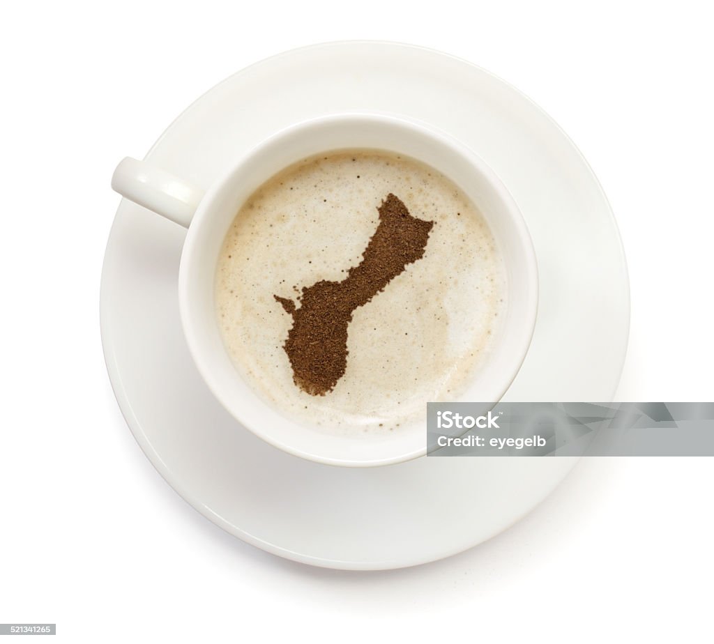 Coffeecup with powder in the shape of Guam A top shot of a cup of coffee with froth and powder in the shape of Guam (Oceania).(series)   How about having a break :) Breakfast Stock Photo